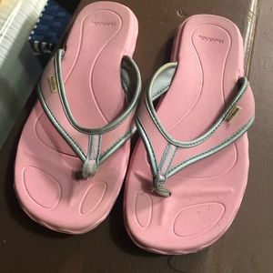 Pink Reebok flip flops